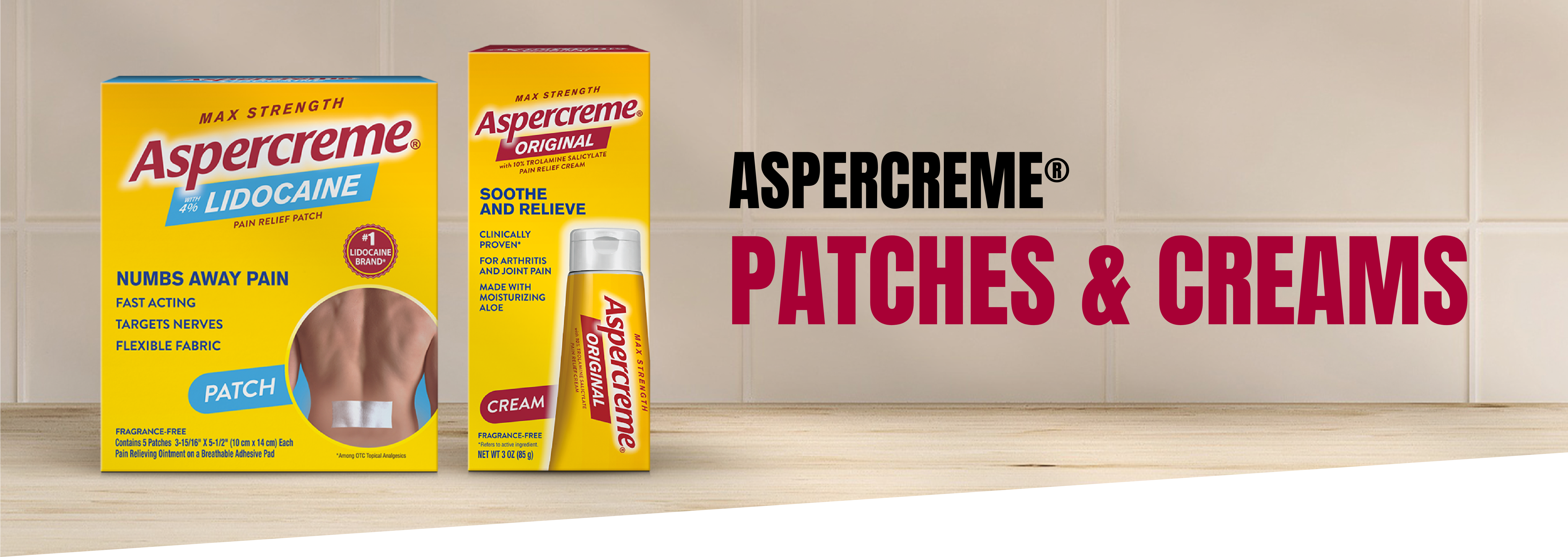 Aspercreme lidocaine pain relief patch and cream are lined up on a countertop